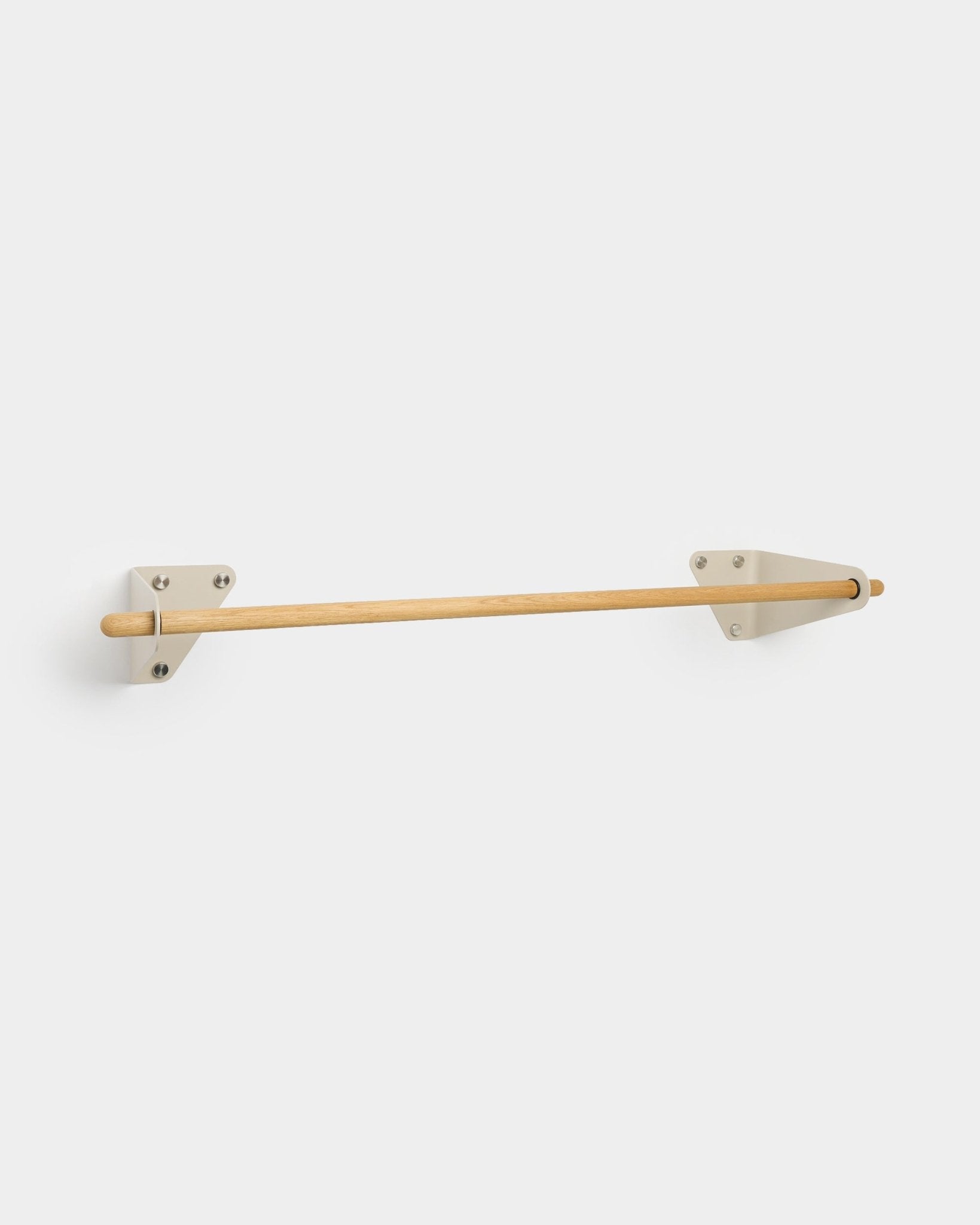 WoodUpp Linn minimalist coat rail in beige, 115.9 cm, with solid oak rod and white metal brackets, shown against a plain background.